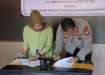 Penandatanganan MOU mengawali kerjasama antara PT. Bank Mandiri (Persero) Tbk Sinjai dengan Polres Sinjai.